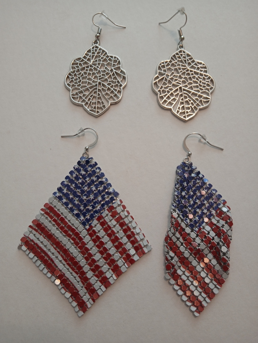 #1224.  2 Piece Silver Toned Filligree & Metal American Flag Earring Bundle